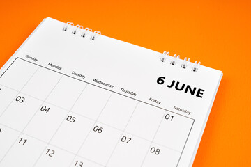June 2024 month calendar on orange color cover background.