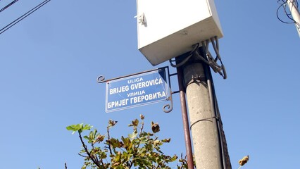 Use of Cyrillic and Latin scripts is common for street signs and names. This practice reflects the country's historical and cultural diversity. 14.10.2023 Becici, Montenegro
