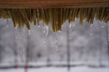 Icicles are open under the eaves.
