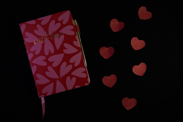 A Red Heart-Shaped Book Note