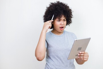 portrait afro african american woman surprise, shock using tablet white background.