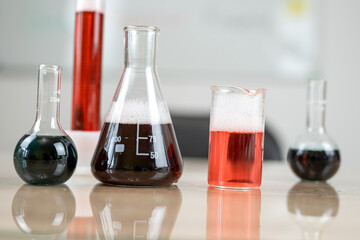  test tube flask with color liquid in laboratory