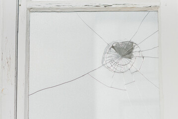Broken window glass in the house.