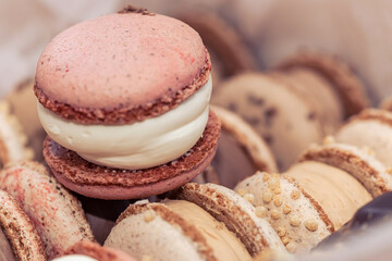 Sweet hand made macarons as delicious french dessert background