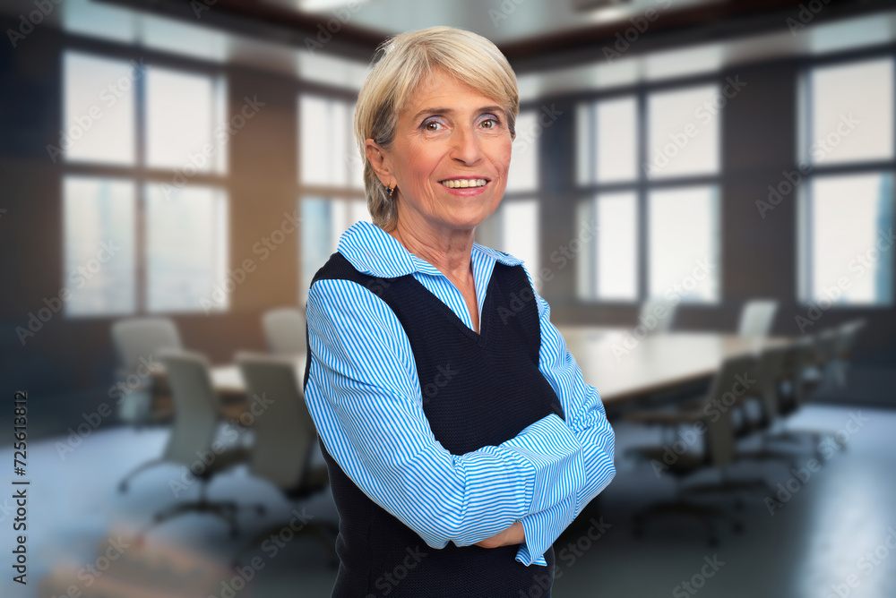 Wall mural elderly woman in the conference room