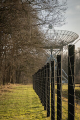 Westerbork Synthesis Radio Telescope WSRT parabolic antennas are astronomy observatory. Radio telescopes astronomical observations in forest of Drenthe Netherlands near preserved Kamp