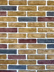 Blank multicolored stonewall background texture. Empty vintage stonework. Copy space. Vertical