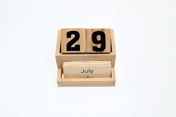 29th of July wooden perpetual calendar. Shot close up isolated on a white background