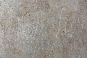 abstract of old dirty scratched metal surface background, weathered grey textured aluminum or silver, rustic wallpaper or backdrop for graphic design