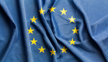 Flag of Europe, top view on a wrinkled European Union blue flag, concept of issue, problem, difficulty and crisis in Euro zone