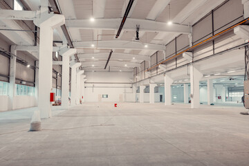 Interior of a New Industrial Building Under Work. Heat and Ventilation Pipes