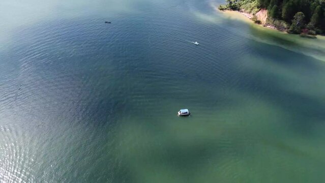 Drone flight over beautiful landscapes of the Guatape dam in Antioquia Colombia