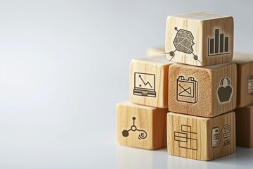a stack of wooden cubes with icons on them