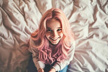 a woman with pink hair sitting on a bed