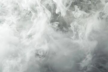 A black and white photo capturing smoke in the air. This image can be used to depict concepts such as mystery, pollution, fire, or atmosphere