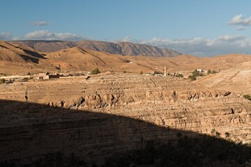 View of Ghoufi village by Ighzer Amellal river. Algeria. Africa.