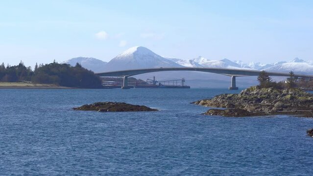 View of beautiful countryside in the Scottish highland with mountains, trees and sea