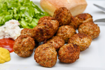 dish with freshly cooked meatballs closeup