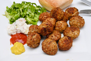 dish with freshly cooked meatballs closeup