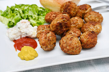 dish with freshly cooked meatballs closeup