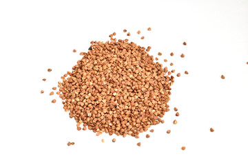 Buckwheat cereal seeds on a white background.