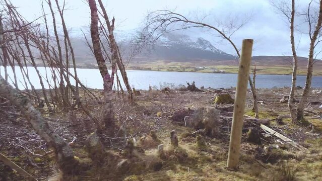 Car point of view, POV driving along a landscape and scenery through beautiful roads in the Scottish highland.