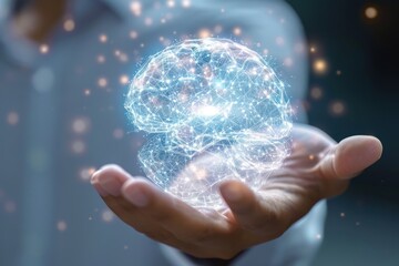 digital brain hologram spinning above male human hand