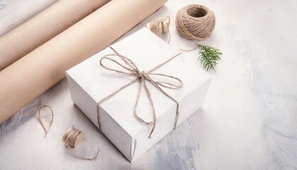 white gift box tied with twine wrapping paper print mockup minimalistic style pastel shades