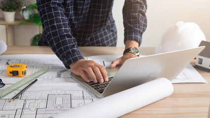 Construction concept Home architects review home plans and custom designs before delivery. Project...