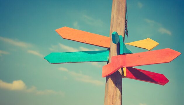 retro styled image of colorful wooden direction arrow signs