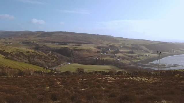 Car point of view, POV driving along a landscape and scenery through beautiful roads in the Scottish highland.