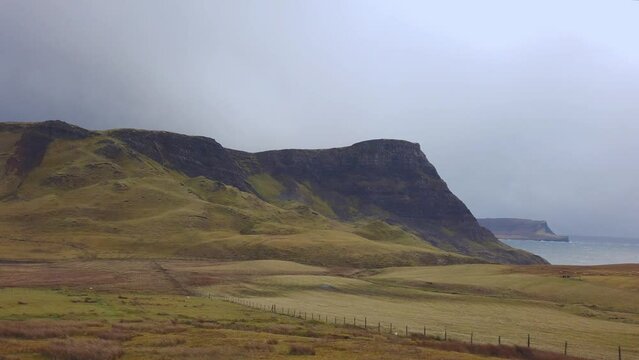 Car point of view, POV driving along a landscape and scenery through beautiful roads in the Scottish highland.
