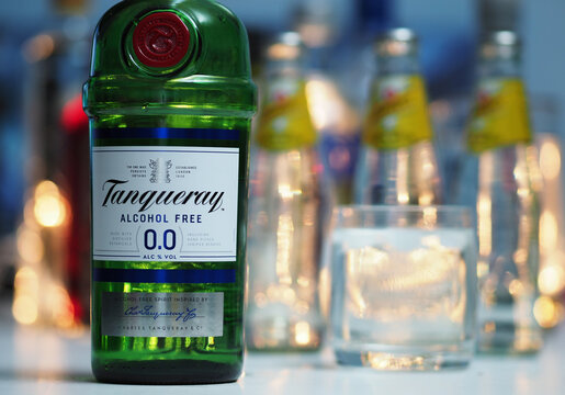 In this photoillustraition bottle of Tanqueray Alcohol Free Gin  in bar