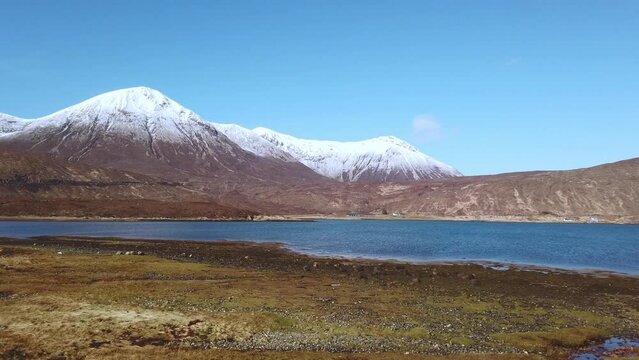 Car point of view, POV driving along a landscape and scenery through beautiful roads in the Scottish highland.