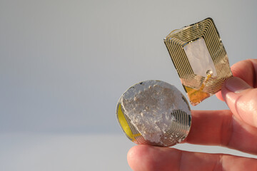 The used radio frequency security labels are in the hand.