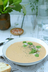 A bowl with mushroom cream soup