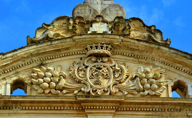Fototapeta na wymiar Baroque details of the Mother Church of Saints Peter and Paul Galatina Lecce Italy