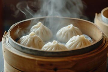 A wooden container filled with dumplings placed on top of a table. Suitable for food-related projects and culinary themes
