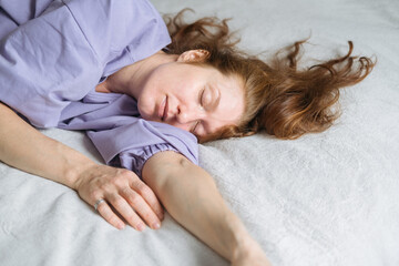 Obraz na płótnie Canvas Woman Asleep in Bed