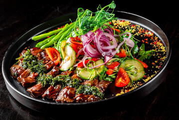Roastbeef salad with vegetables on plate