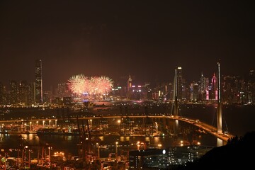 Fototapeta na wymiar Fireworks in Victoria Harbour of Hong Kong