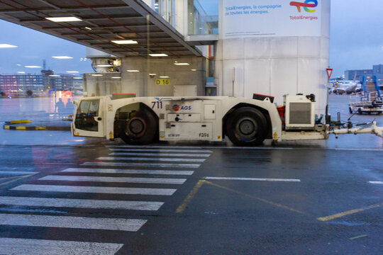 Ile de France, France October 24, 2023: Ground Operations - AGS Pushback Truck at Charles de Gaulle Airport.