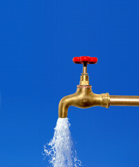 Water runs from a tap