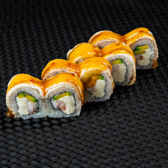 Sushi with eel and sauce. Delicious Sushi. Asian snack.