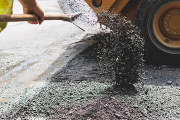 Process of asphalting, blacktopping and paving, asphalt paver machine and steam roller compactor during construction and repairing works, workers on the construction site, rental vehicle working - obrazy, fototapety, plakaty