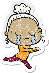 distressed sticker of a cartoon crying old lady