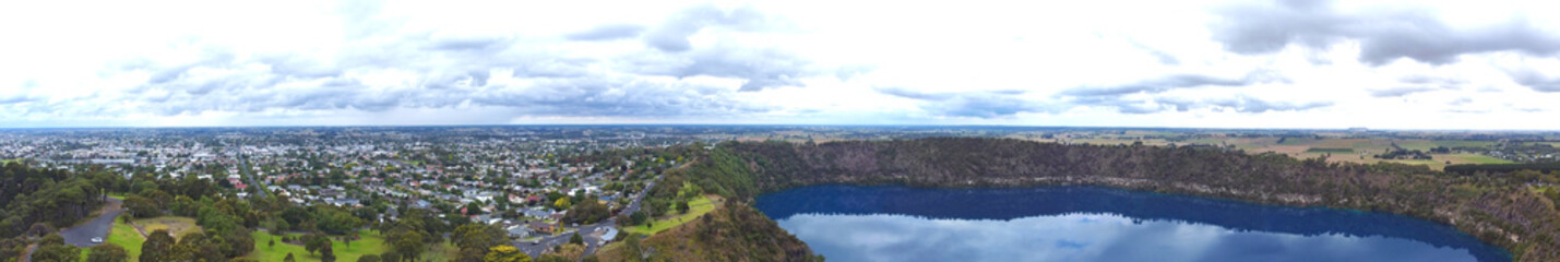 Panoramic Aerial view of Blue Lake is a large, monomictic, crater lake located in a dormant volcanic at Mount Gambier in the Limestone Coast region of South Australia.