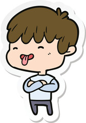 sticker of a cartoon boy sticking out tongue