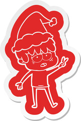 cartoon  sticker of a exhausted boy wearing santa hat