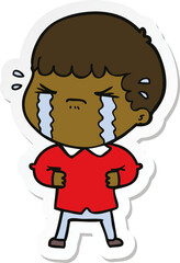 Obraz premium sticker of a cartoon man crying